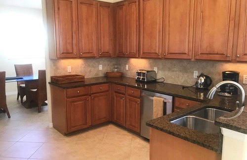 Braden River House | 8304-102 Gorgeous golf and lake view coach home next to pool