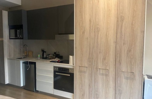 Menlyn Apartment | A beautiful studio apartment with Times Square and Menlyn Maine next to property