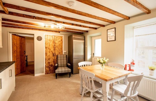 Aberporth House | A beautifully renovated farm house on the coast with a hot tub & outdoor bar