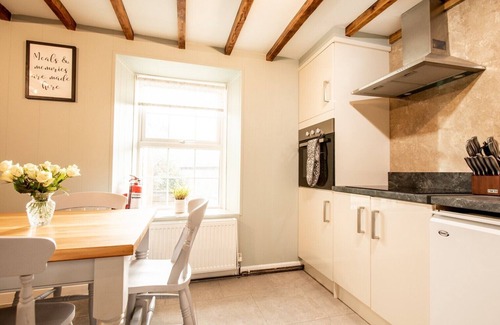 Aberporth House | A beautifully renovated farm house on the coast with a hot tub & outdoor bar