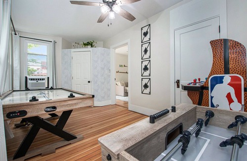 Ludington House | A block from the beach! Sleeps 20! Hot Tub, Game Room!