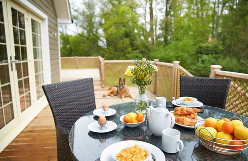 Pattiswick Cabin | A delightful lodge with hot tub on Wakes Hall Farm is a haven of peace in 500 acres of private land