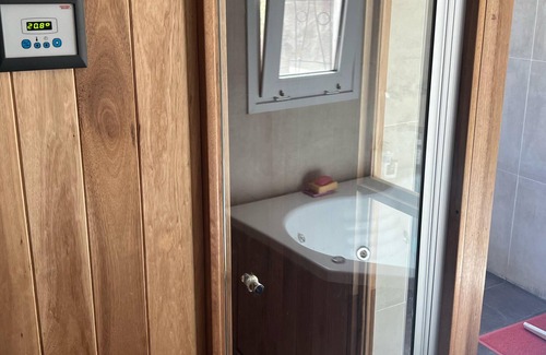 Cordoba House | A great room with a comfortable bathroom with hot tub