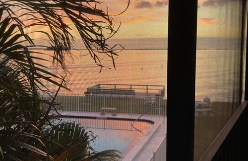 Dunedin Condo | A little piece of paradise with a heavenly water view! Returns to rental market!