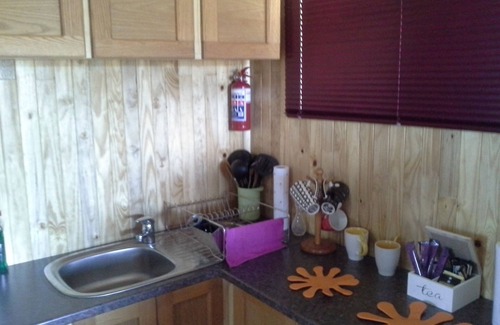 Sabie Cabin | A log style cabin having one major room