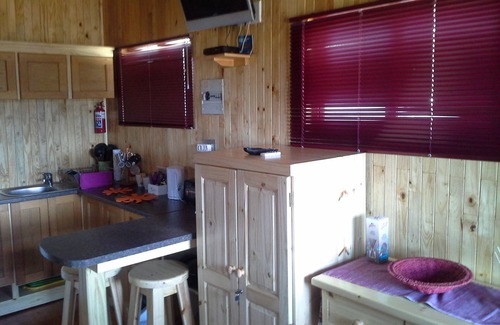 Sabie Cabin | A log style cabin having one major room