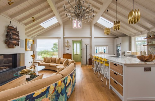 Deal House | A luxurious waters-edge holiday home by the sea sleeping 11 right on the beach