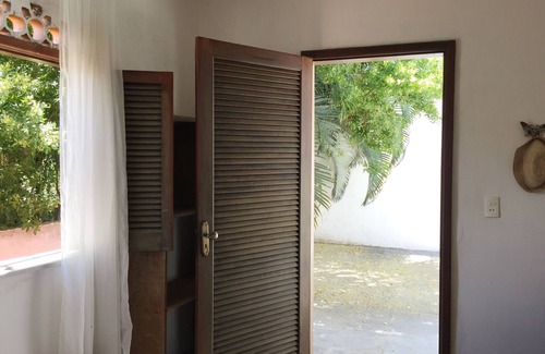 Itapua House | A magic place. surrounded by nature. and the colors of Bahia.