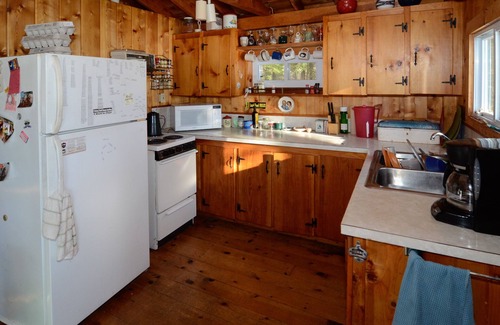 Vienna House | A Private 7-Acre Island Sanctuary on Flying Pond in Maine’s Scenic Lake Country