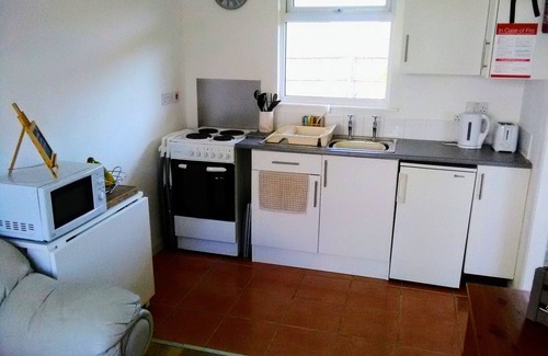 West Bay House | Accommodation for a couple, just a short walk from the beaches and harbour.