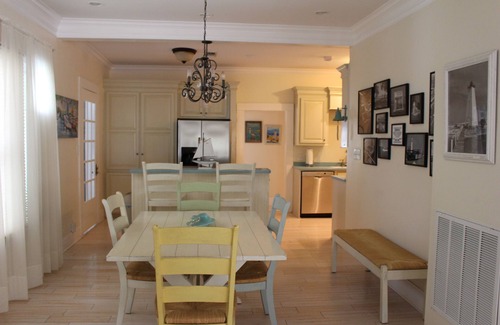 Gulfport House | After beach time come back to an outdoor soaking tub in privacy fenced back yard