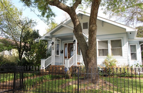 Gulfport House | After beach time come back to an outdoor soaking tub in privacy fenced back yard