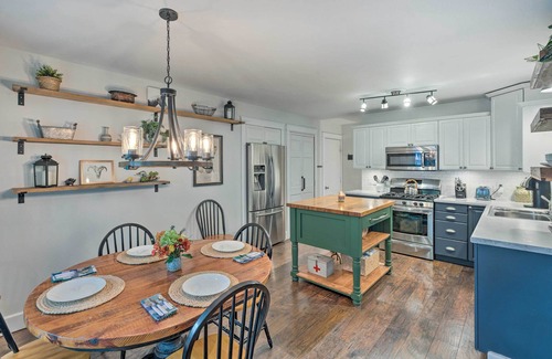 Lake Mills Cottage | Airy Cottage Close to Rock Lake w/Fire Pit!