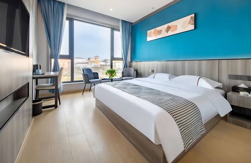 Weicheng District Hotel | aiweitingjiudian