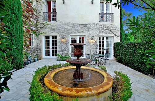 San Juan Capistrano House | Aix-en-Provence style French chateau with pool and gardens