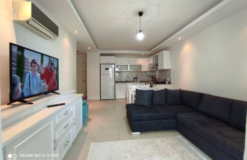 Avsallar Apartment | Akdeniz kıyısına çok yakın.Muhteşem kumsalında deniz ve havuzun keyfini çıkarın.