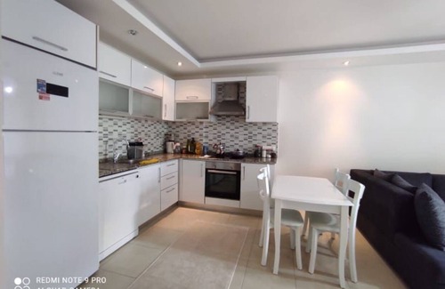 Avsallar Apartment | Akdeniz kıyısına çok yakın.Muhteşem kumsalında deniz ve havuzun keyfini çıkarın.