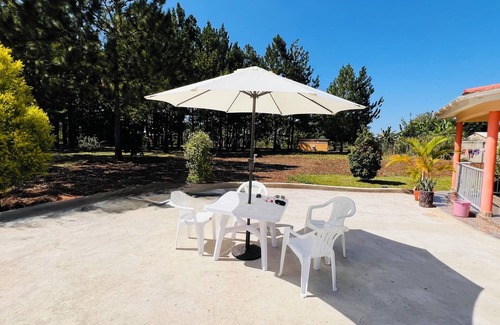 Northern Region Cottage | Alberto Gardens - Two bedroom cottage in private grounds & free parking