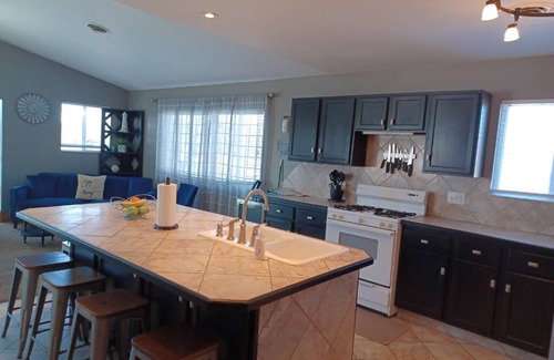 Monticello House | Alexander’s Landing Penthouse - Lakefront, Balcony, and Room to Relax