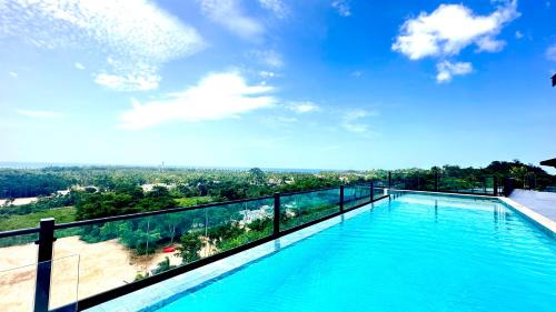 La Ceiba Apartment | All-New Zen Apartment with TreeTops and Ocean Views !
