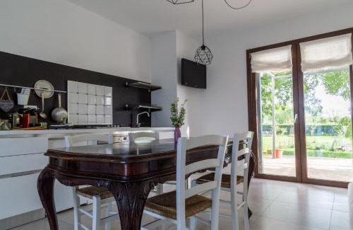 Taglio di Po House | all'ombra del Bagolaro