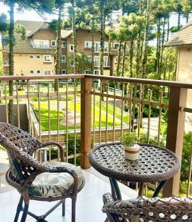 Carniel Apartment | Alto Padrão com lareira, piscina e vista incrível