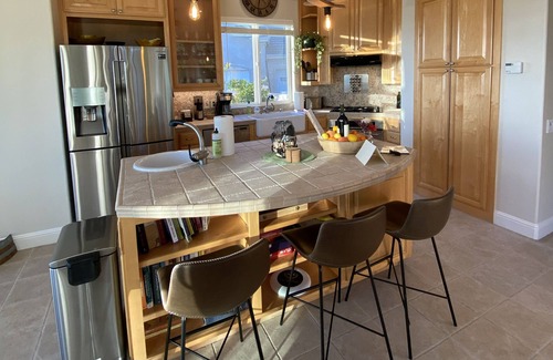 San Martin House | An elegant B&B with a pool & hot tub located above Moose Mountain Vineyards