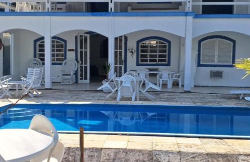 Caieira House | ANGRA CASA 6 SUITES PONTA DOS UBÁS - Mar Piscina Deck Churrasqueira Jogos