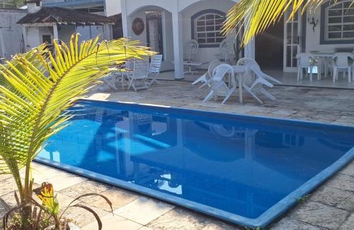 Caieira House | ANGRA CASA 6 SUITES PONTA DOS UBÁS - Mar Piscina Deck Churrasqueira Jogos