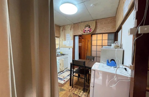 Toyonaka House | AnNam Stay NEW HOTARUGAIKE: 15 minute walk to Osaka Airport (Itami Airport)! 15 minutes to Umeda by train! Two-story, one-group townhouse.