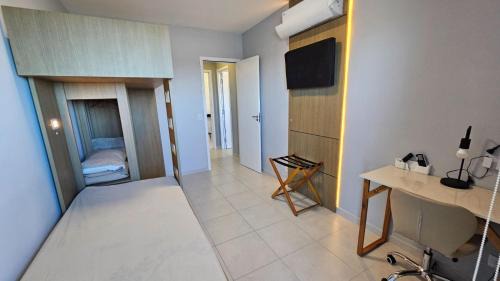 Vila Anhanguera Apartment | Ap frente mar com ar-condicionado e varanda gourmet