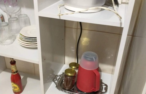 Maringa Apartment | Ap08 red space air conditioning Queen bed