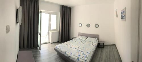 Saturn Apartment | Apartament Langa Plaja Diana