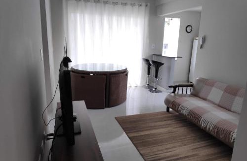 Muriae Apartment | Apartamento Ar condicionado, varanda, 2 vagas garagem