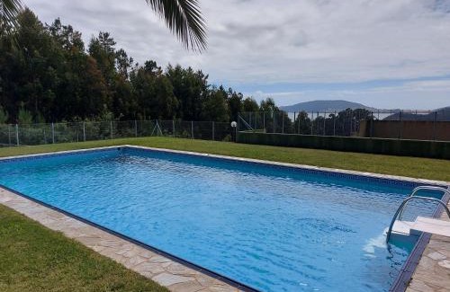 Sardinero Apartment | APARTAMENTO PLAYA DE ESTORDE - Piscina y playa en el corazon da Costa da Morte