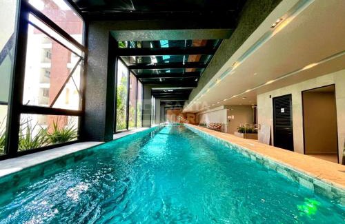 Centro Apartment | Apartamento Suíte e 1Q Premium Centro com Piscina, Academia e Garagem