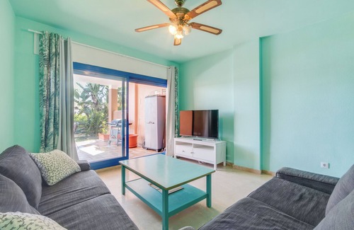 Castillo de Sabinillas Apartment | Apartment 'Duquesa Suites Golf and Gardens' with Shared Pool, Wi-Fi and Air Conditioning