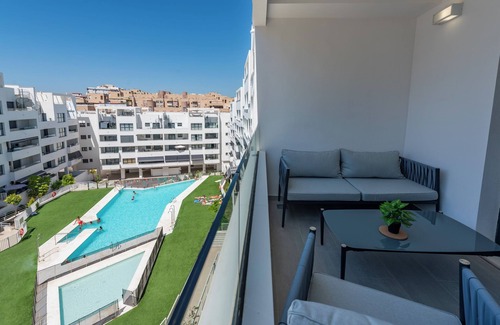 Estepona Apartment | Apartment 'Figaro Terrace&Pool Apartment' with Shared Pool, Wi-Fi and Air Conditioning