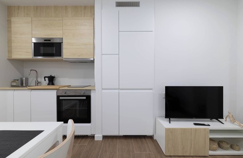 Rates Apartment | Apartment 'Ría De San Cosme Candida' with Mountain View, Shared Garden and Air Conditioning