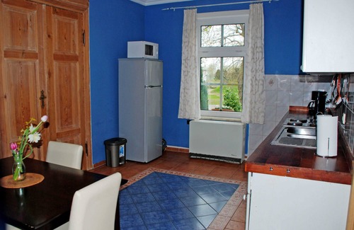 Ralswiek Apartment | Apartment Rügen with fireplace - Apartments in the manor house Gnies