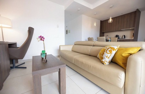 Cala Agulla Apartment | Apartment 'Suite 1' with Shared Pool, Wi-Fi and Air Conditioning