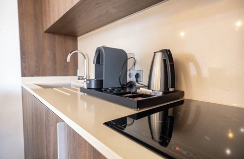 Cala Agulla Apartment | Apartment 'Suite 1' with Shared Pool, Wi-Fi and Air Conditioning