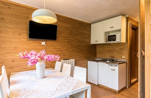 Marilleva Apartment | Apartment 'Volpi' with Mountain View and Shared Terrace