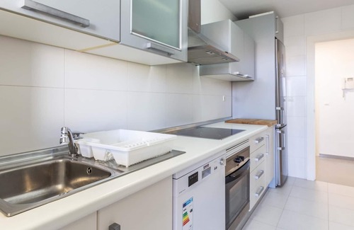 Playa Granada Apartment | Apartment with balcony and community pool