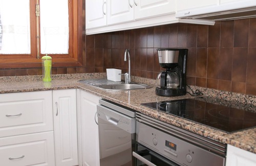 Brena Baja Apartment | Apartment with stunning views of the sea, garden, pool and free Wi-Fi.