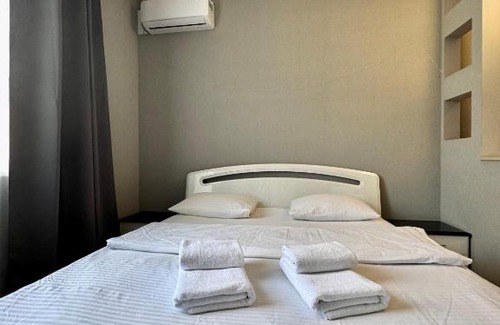 Sukhinovka Apartment | ApartPoltava Світлі та стильні апартаменти в центрі Полтави біля театру Гоголя, ЦУМ, банківський ЧЕК