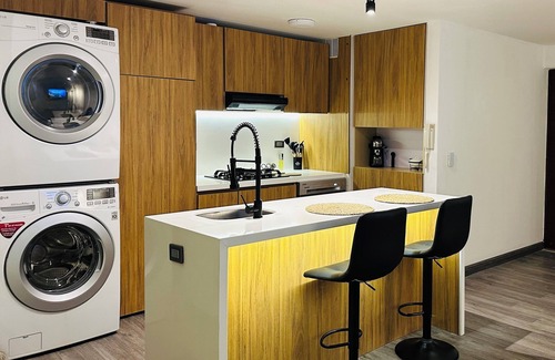 Calle 100 Apartment | Apt with private jacuzzi sauna sauna fireplace cinema and gym king size bed 93 park