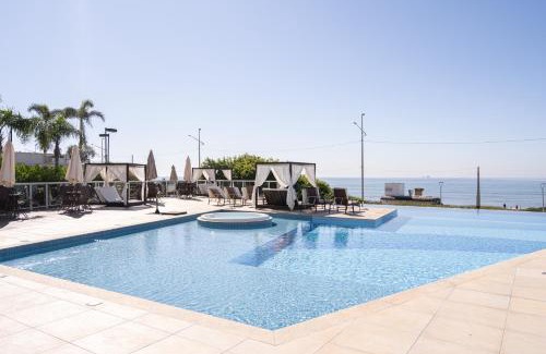 Itacolomi Apartment | Apto Vista Mar Home Club Pé na Areia 3 Quartos Ares Condicionados Cozinha Completa Piscina Aquecida Jacuzzi Sauna Academia Quadra Playground Salão de Jogos 15min do Beto Carrero