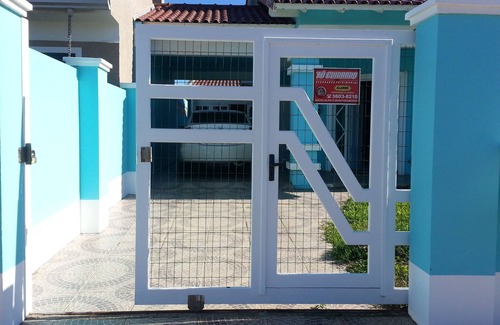 Osorio House | Atlântida Sul/two blocks from the sea/swimming pool/4 bedrooms with air conditioning/internet/cable TV