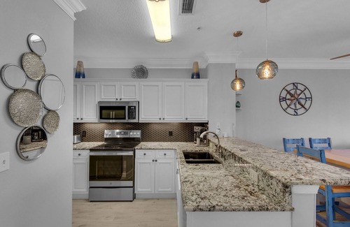 Frangista Beach Condo | Awesome Ground Floor Condo, Steps From Beach, Heated Pool & Spa! Pet Friendly!